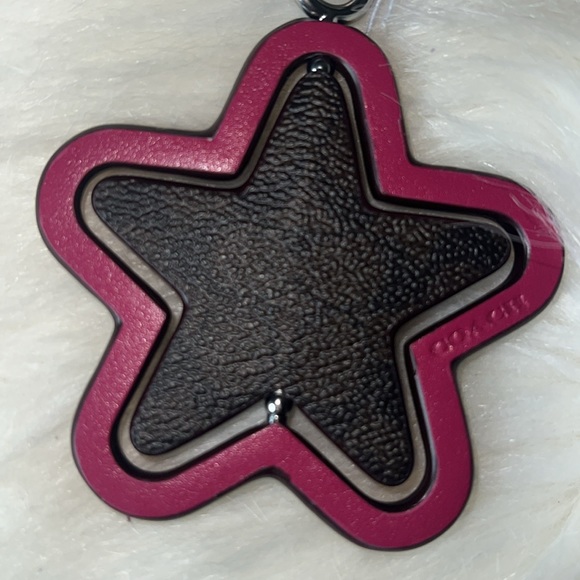 SPINNING STAR BAG CHARM IN SIGNATURE CANVAS - Picture 4 of 6